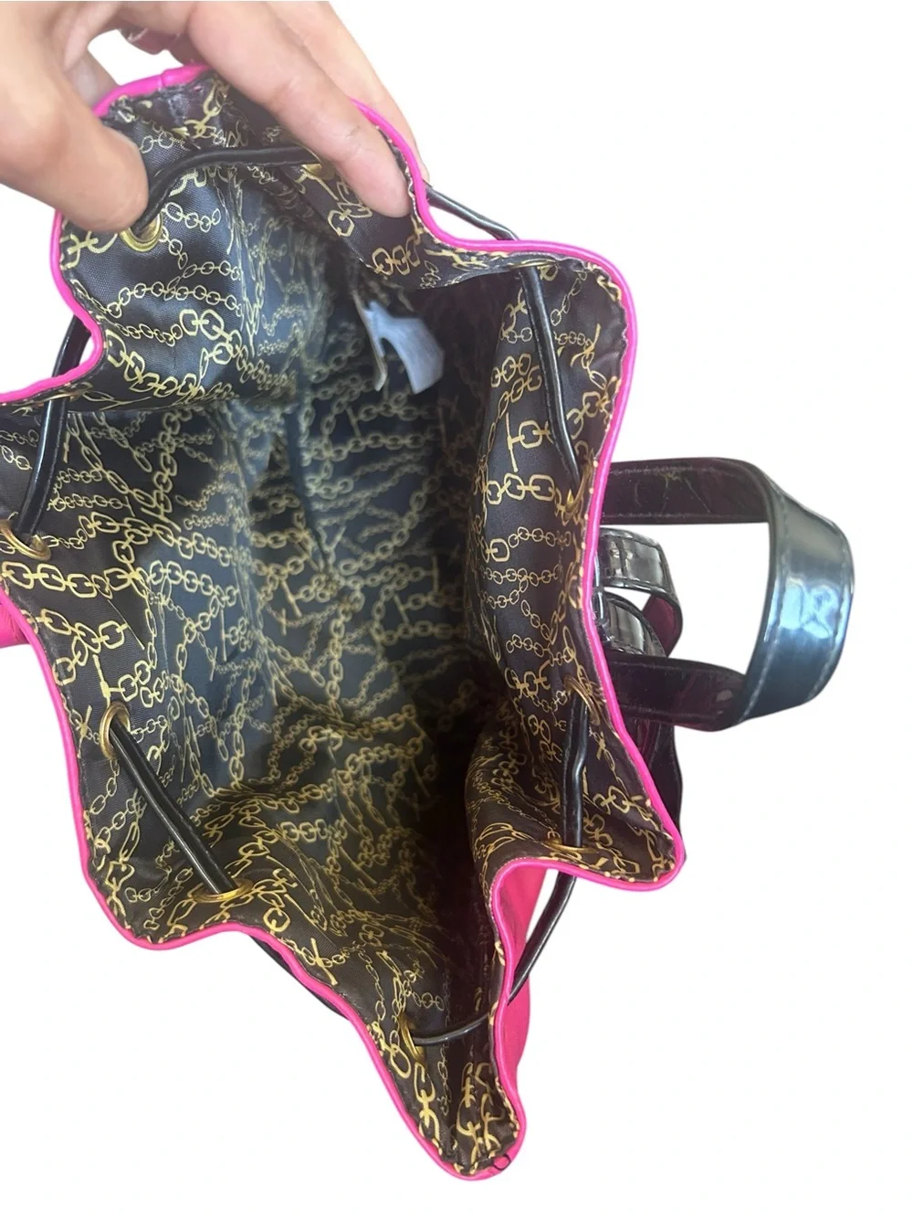 Juicy Couture Vibrant Pink Drawstring Backpack with Gold Accents